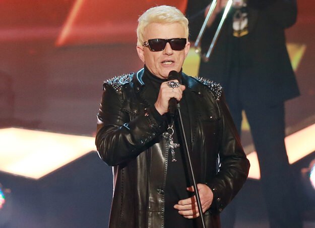 Heino performing on stage.