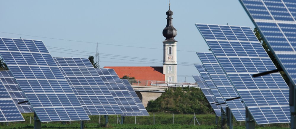 Photovoltaic system in front of a church building