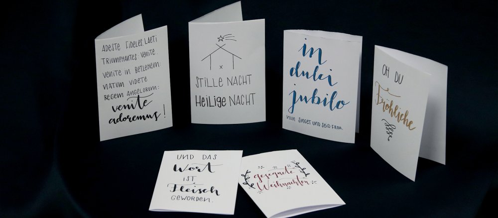 Sechs unterschiedlich gestaltete Weihnachtskarten von katholisch.de zum Download