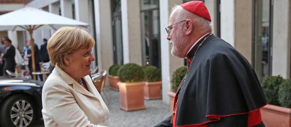 Kardinal Reinhard Marx begrüßt Bundeskanzlerin Angela Merkel