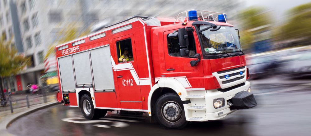 A fire engine on its way to the scene.