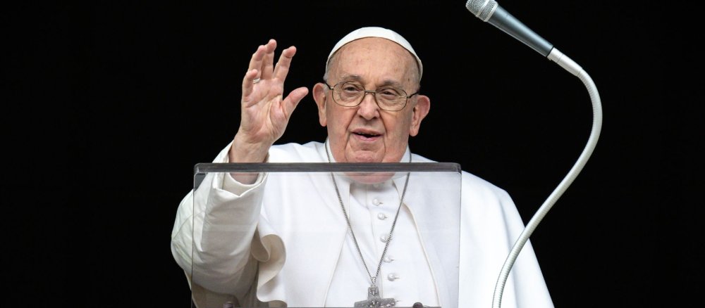Pope Francis at the window of the Apostolic Palace during the Angelus prayer.