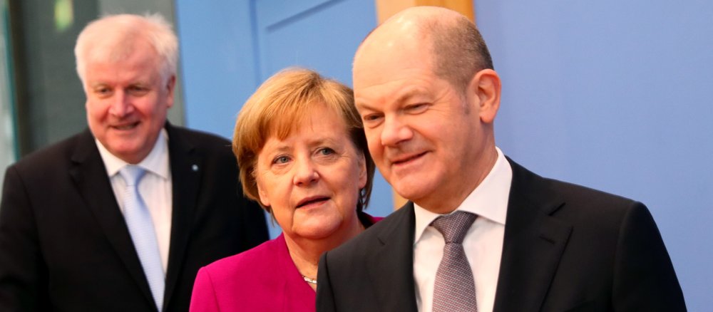 Horst Seehofer (CSU), Angela Merkel (CDU) und Olaf Scholz (SPD in der Bundespressekonferenz.