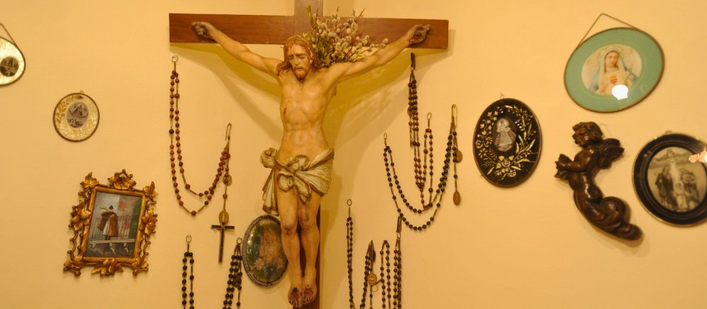 Crucifix and rosary in a Bavarian Herrgottswinkel