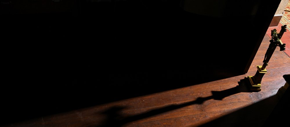 Schatten eines Kreuzes