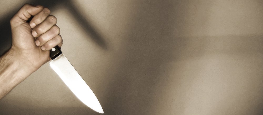Hand with knife