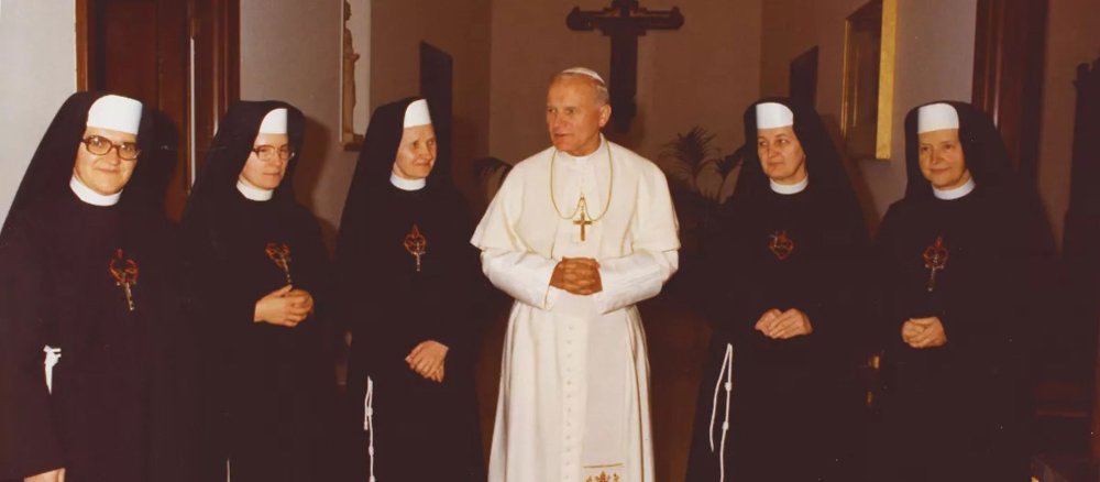 Pope John Paul II with the Servite Sisters who looked after his household.