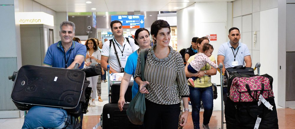 Geflüchtete Familien aus Syrien und dem Irak kommen 5. Juli 2017 am Pariser Flughafen Charles de Gaulle an.