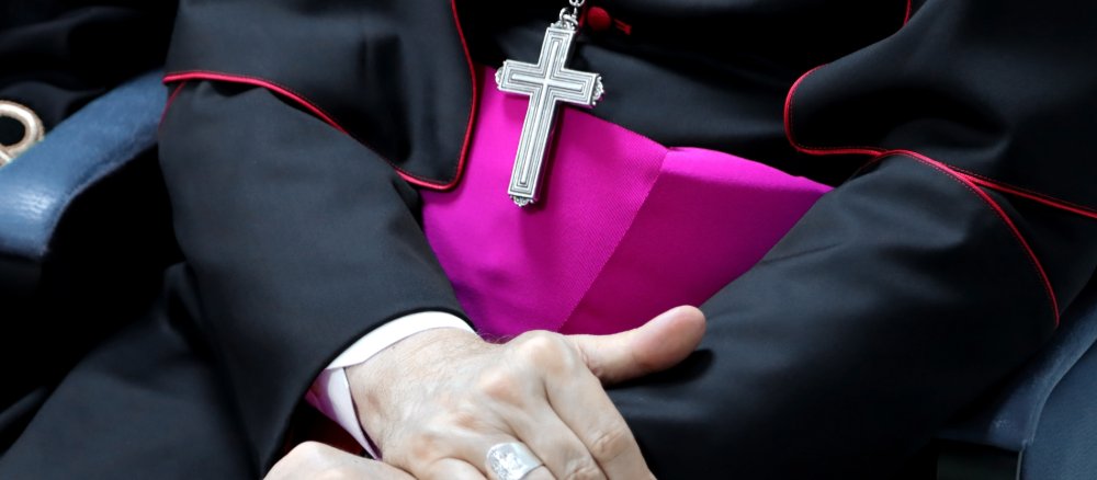 Bishop sitting