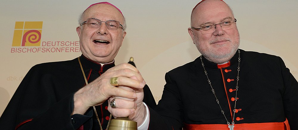 Erzbischof Robert Zollitsch (l.) und Kardinal Reinhard Marx am 13. März 2014 bei der Vollversammlung der Deutschen Bischofskonferenz in Münster.
