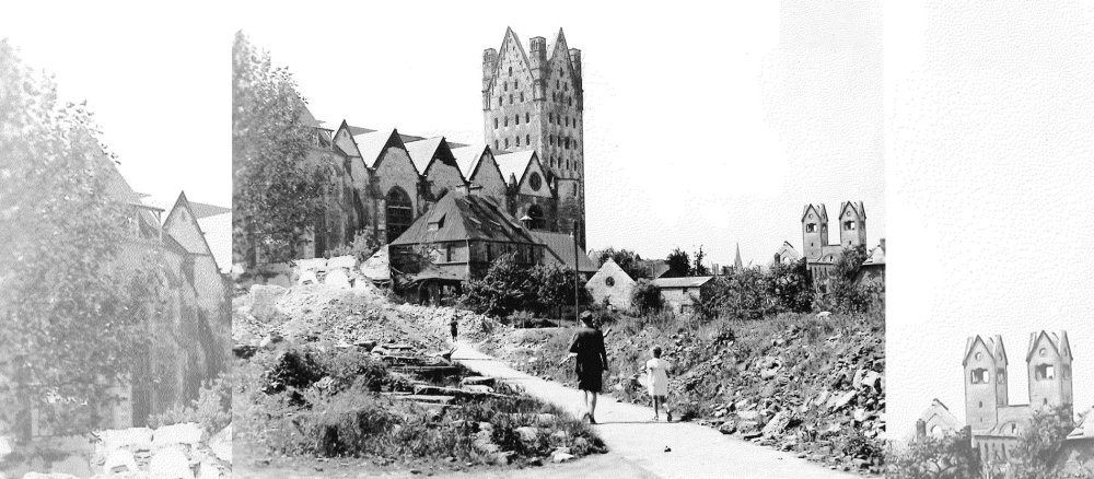 Eine Mutter geht mit ihrem Kind durch die zerstörte Stadt Paderborn, im Hintergrund ragt die Ruine des Domes auf.